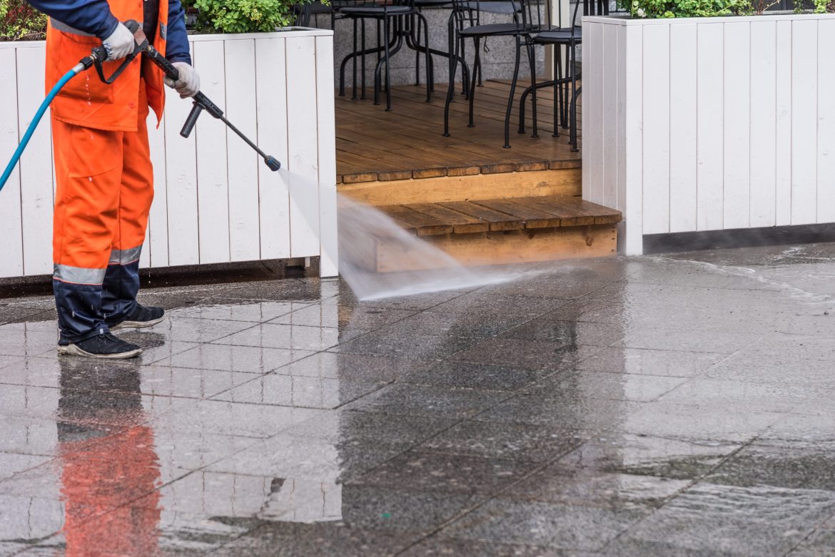 Can power washing damage plants and landscaping?
